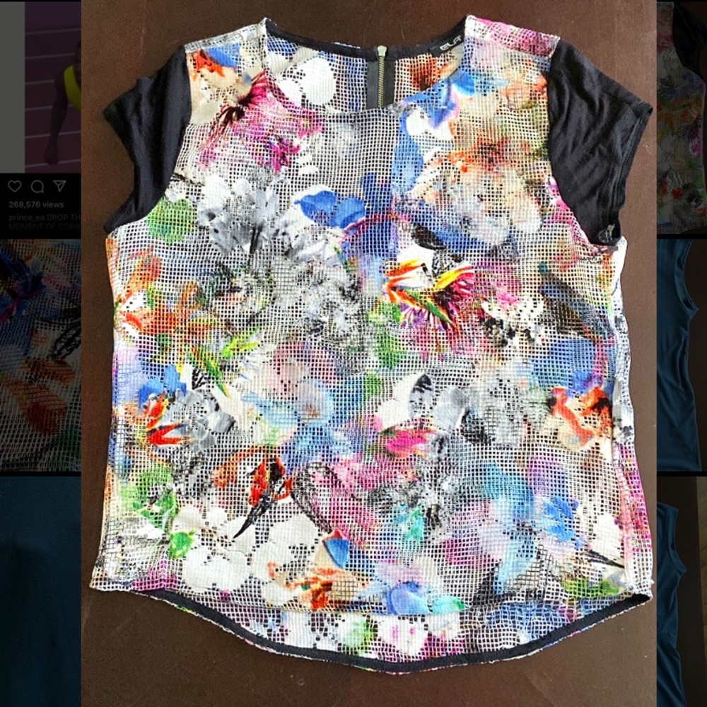 Women’s mesh short sleeved top, size Medium.